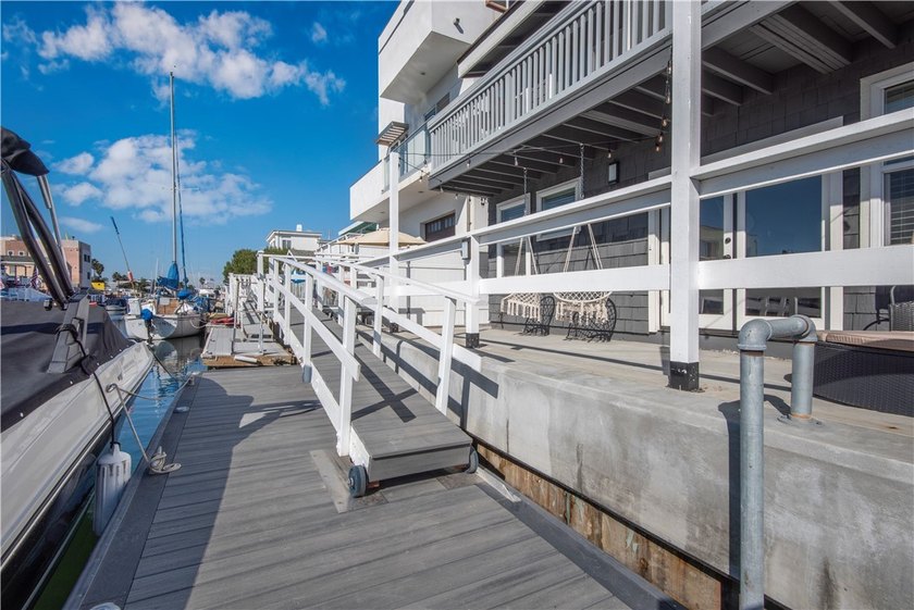 This stunning three-level waterfront home on Sunset Island - photo 24