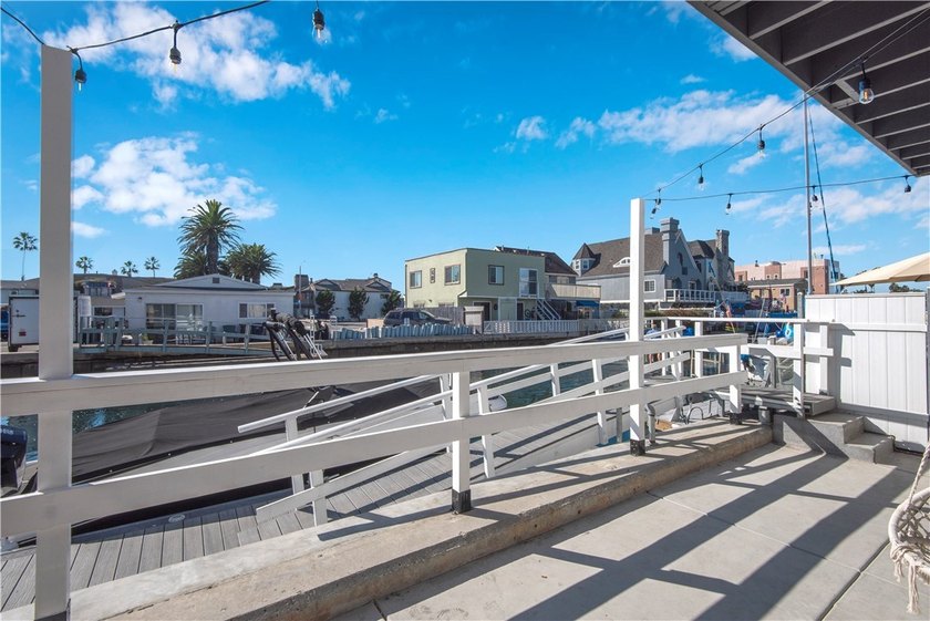 This stunning three-level waterfront home on Sunset Island - photo 26
