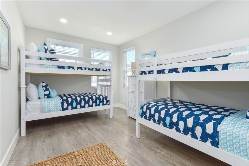 This stunning three-level waterfront home on Sunset Island - photo 29
