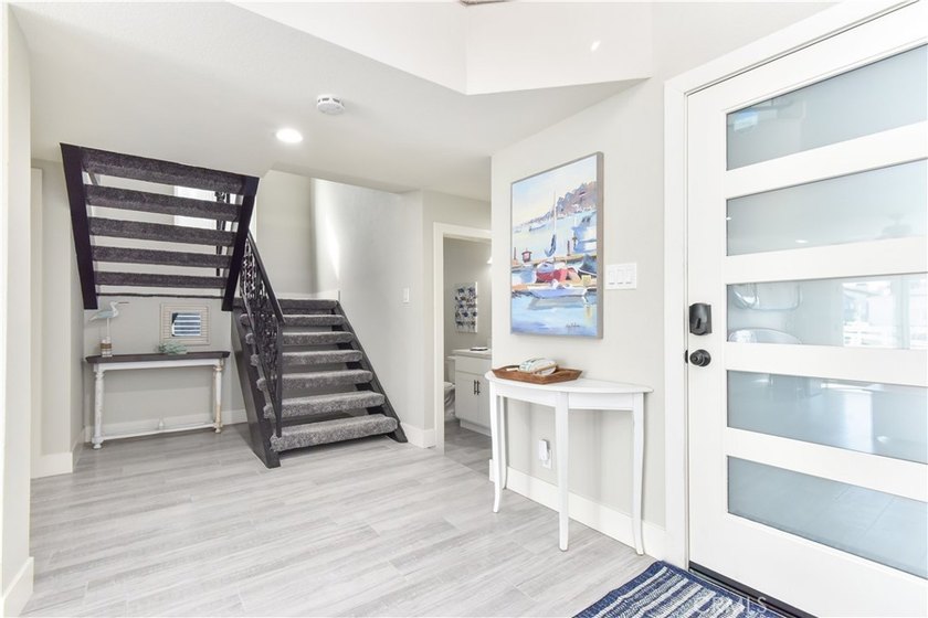 This stunning three-level waterfront home on Sunset Island - photo 35