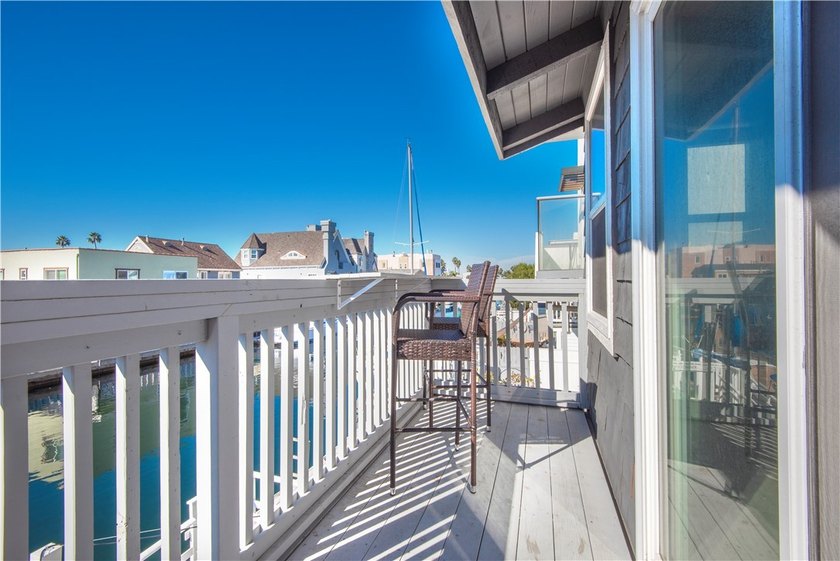 This stunning three-level waterfront home on Sunset Island - photo 42