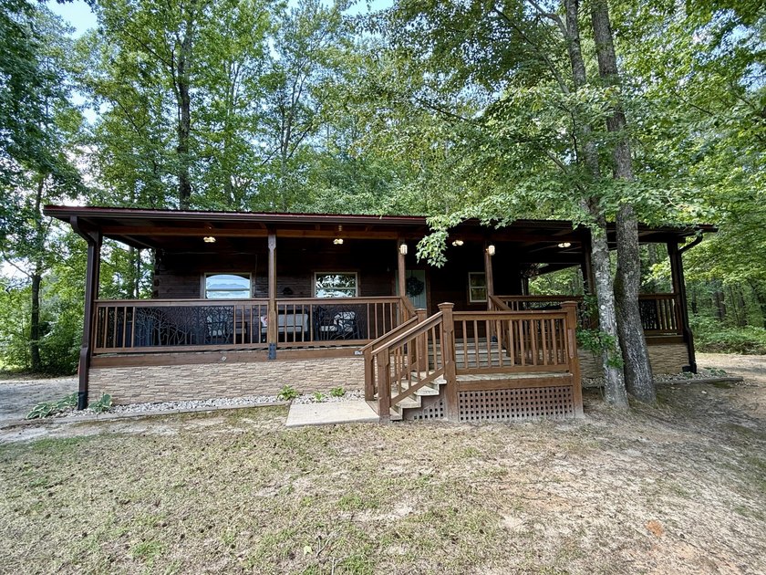 Set on 32.69 scenic acres, this charming log home offers a - photo 4