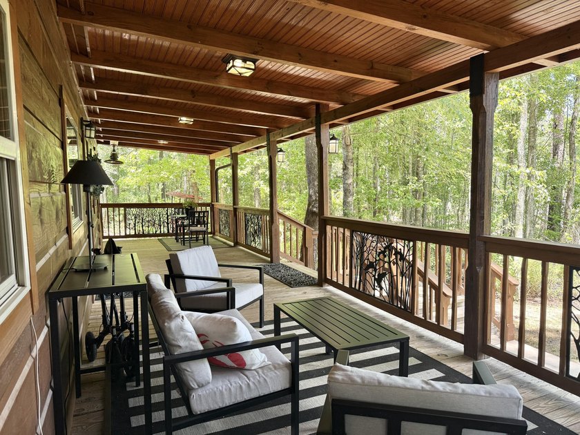 Set on 32.69 scenic acres, this charming log home offers a - photo 6