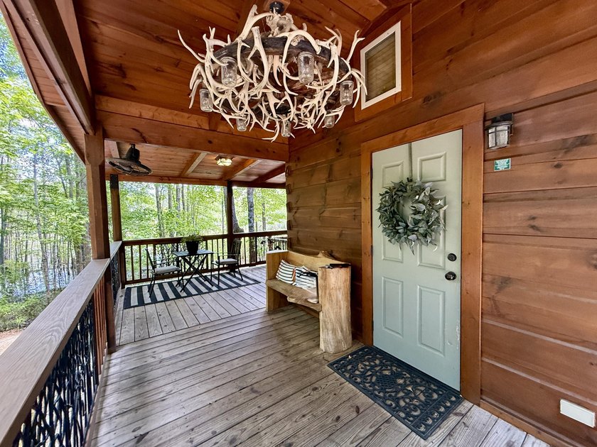Set on 32.69 scenic acres, this charming log home offers a - photo 8