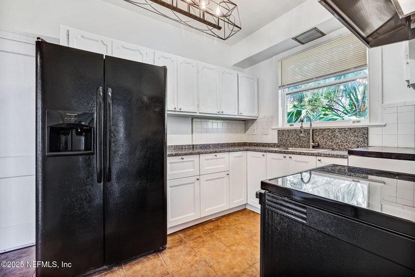 Gorgeous riverfront property with the perfect blend of historic - photo 11