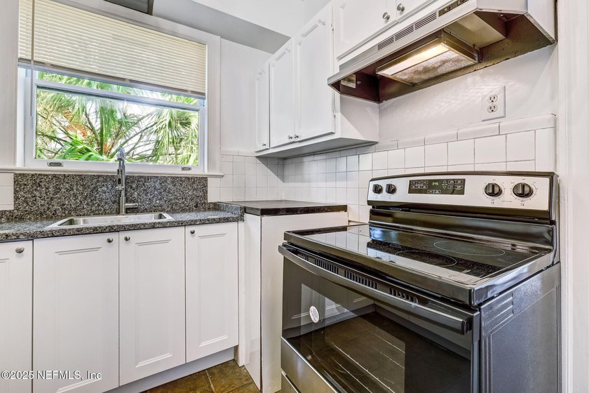 Gorgeous riverfront property with the perfect blend of historic - photo 12