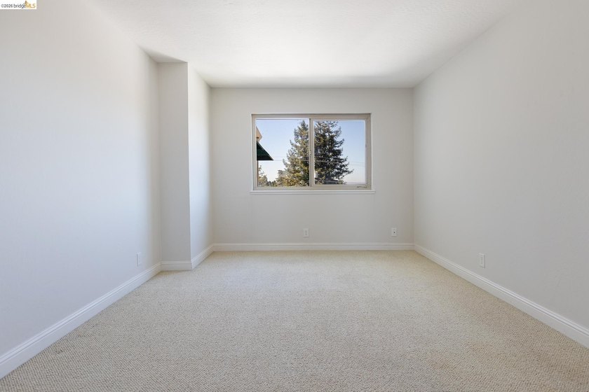 Welcome to this inviting third-floor corner unit featuring 2 - photo 12