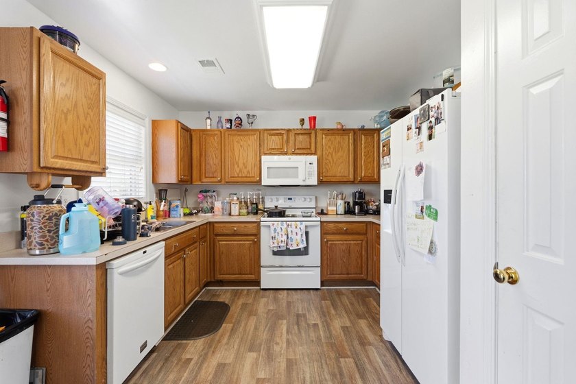 This beautifully maintained home is located in the highly - photo 8