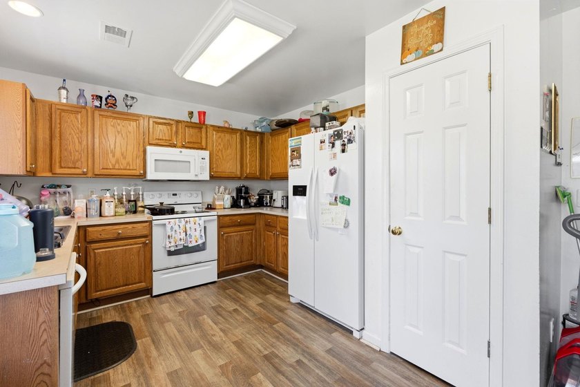 This beautifully maintained home is located in the highly - photo 9