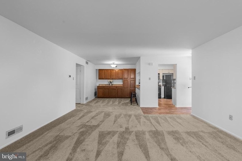 A MUST see move-in ready condo in the well-maintained and - photo 3