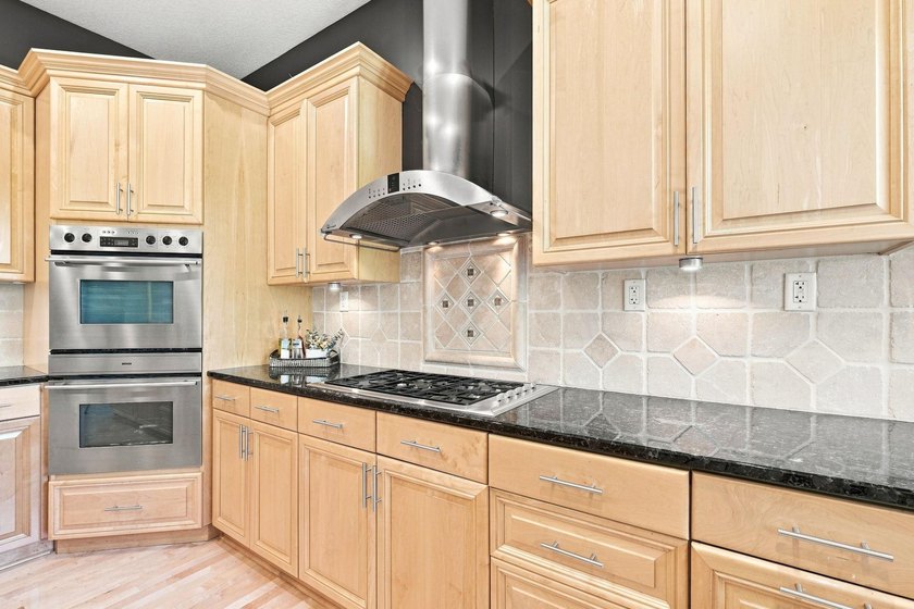 Luxury, craftsmanship, and extensive recent improvements come - photo 8