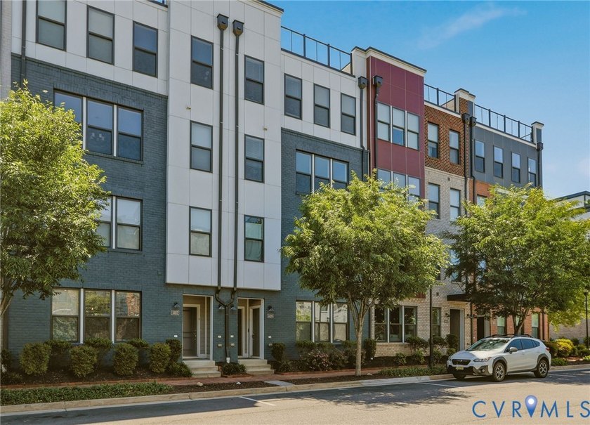 This beautifully designed two-story townhome style condo with a - photo 7