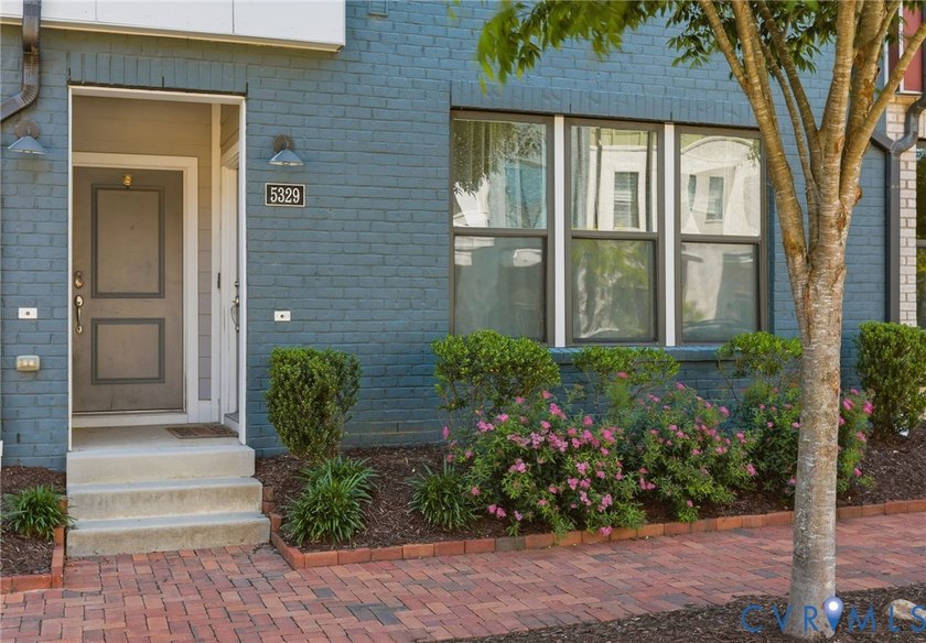 This beautifully designed two-story townhome style condo with a - photo 8