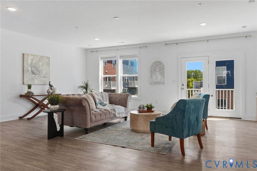 This beautifully designed two-story townhome style condo with a - photo 9
