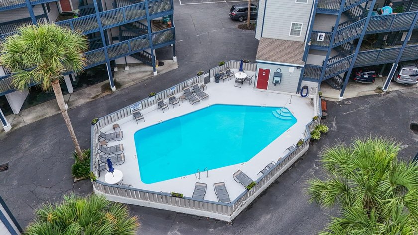 Welcome to the Coast! This 2 bedroom, 2 bathroom condo, is - photo 4