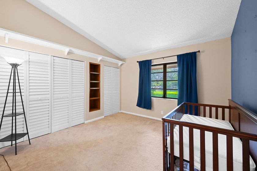 Welcome to this charming two-bedroom, two-bathroom villa in - photo 17