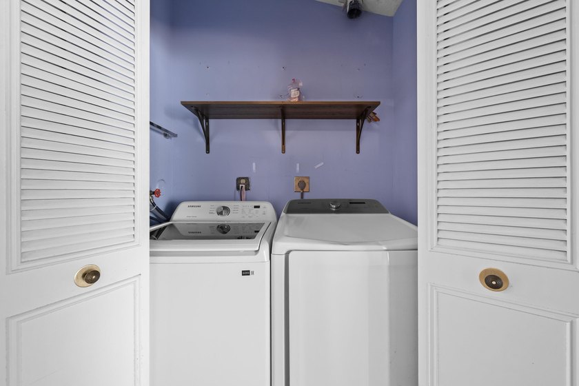 Welcome to this charming two-bedroom, two-bathroom villa in - photo 21