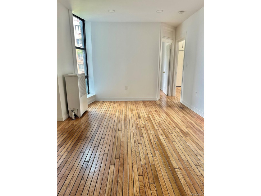 This fully renovated, spacious 2-bedroom apartment features - photo 9