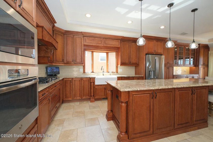 Welcome to this custom-built two-family detached home! This - photo 11