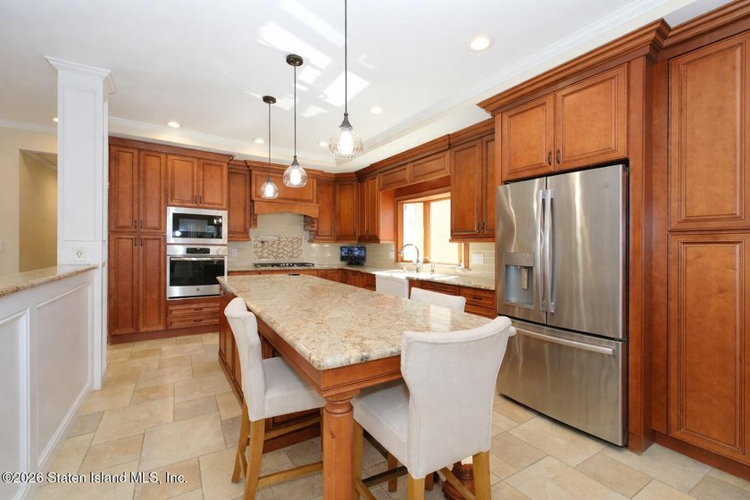 Welcome to this custom-built two-family detached home! This - photo 13
