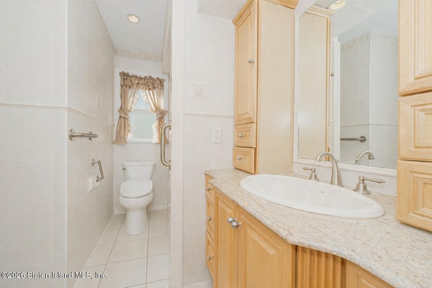 Welcome to this custom-built two-family detached home! This - photo 23