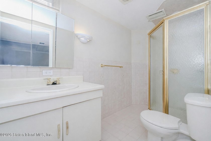 Welcome to this custom-built two-family detached home! This - photo 26