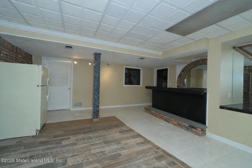 Welcome to this custom-built two-family detached home! This - photo 37