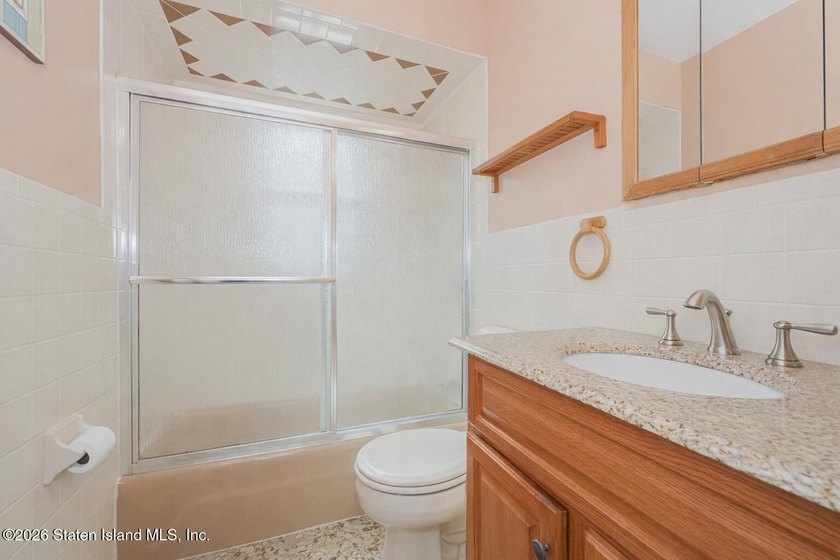 Welcome to this custom-built two-family detached home! This - photo 45
