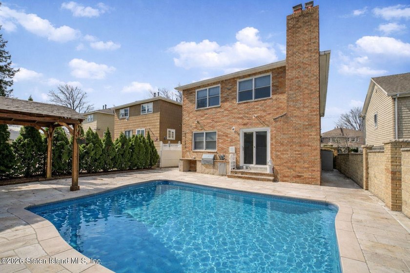 Welcome to this custom-built two-family detached home! This - photo 46