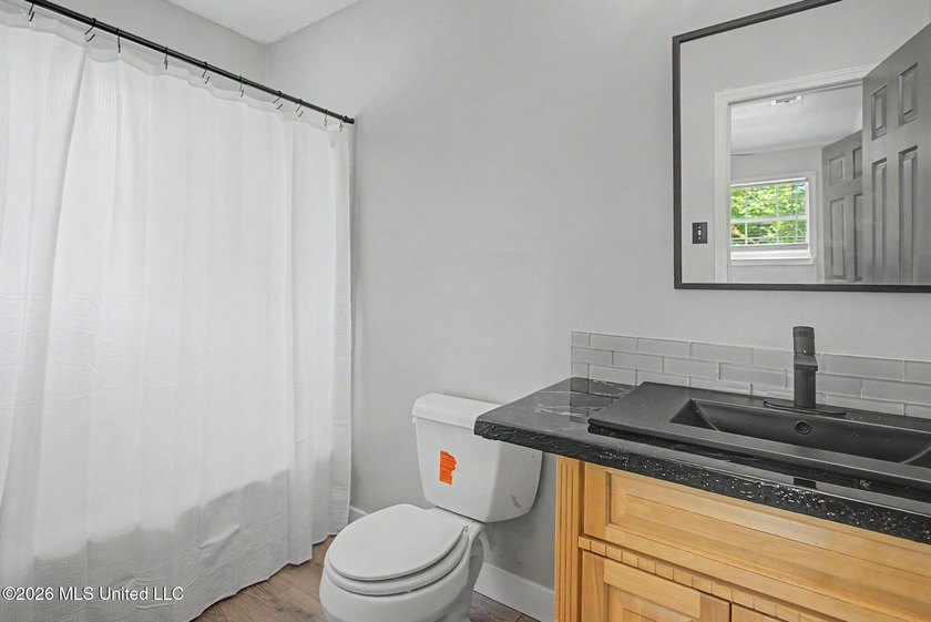 Located in a highly convenient area, this 4 bedroom, 2 bath - photo 22
