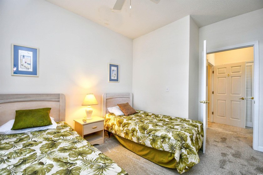 You will love this beautiful top floor end unit offering 2 - photo 20