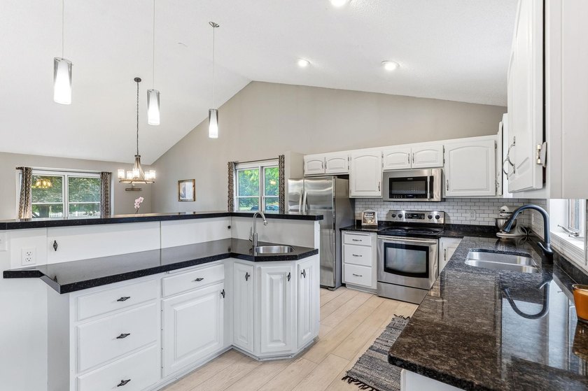 Welcome to this 4 bed 3 bath home offering abundant space for - photo 8