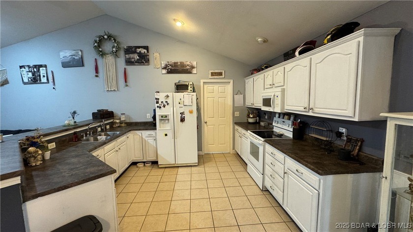 Welcome to your dream home in Gravois Mills! This delightful - photo 14