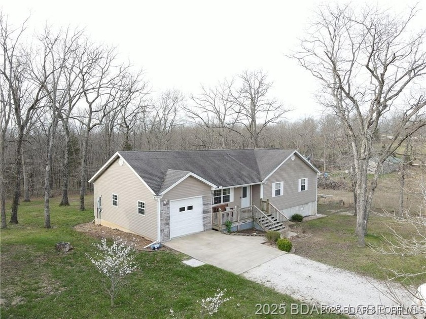 Welcome to your dream home in Gravois Mills! This delightful - photo 35
