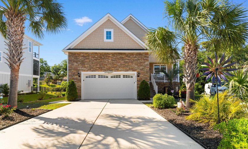This spacious 4-bedroom, 3-bath home offers a versatile open - photo 3