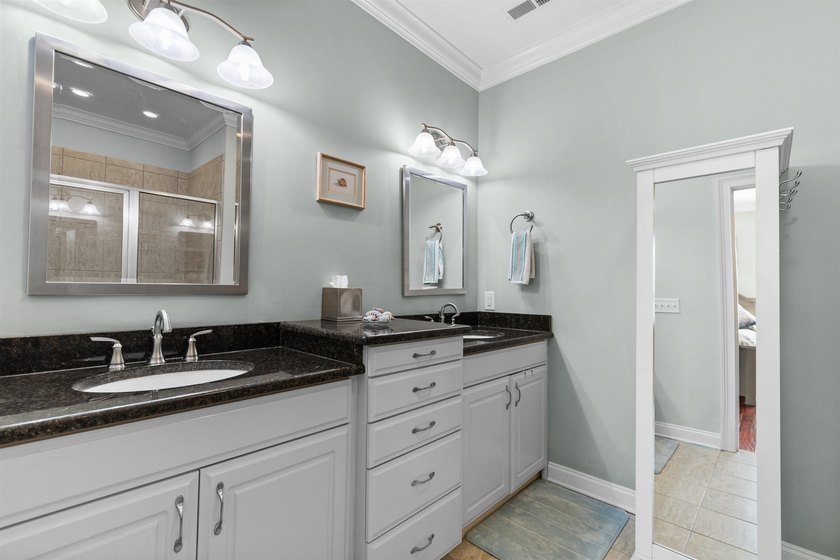This spacious 4-bedroom, 3-bath home offers a versatile open - photo 4