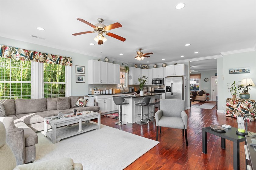 This spacious 4-bedroom, 3-bath home offers a versatile open - photo 8