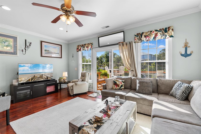 This spacious 4-bedroom, 3-bath home offers a versatile open - photo 9