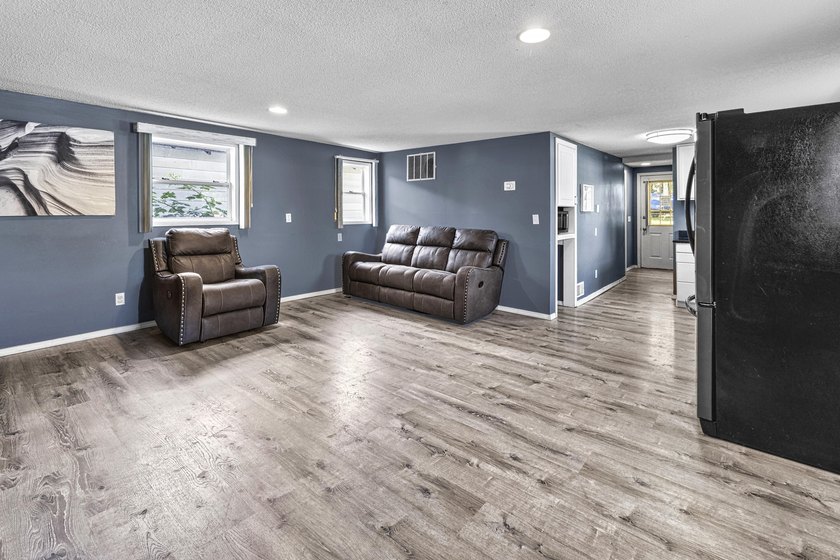 Wake up to beautiful views of Houghton Lake from the spacious - photo 11