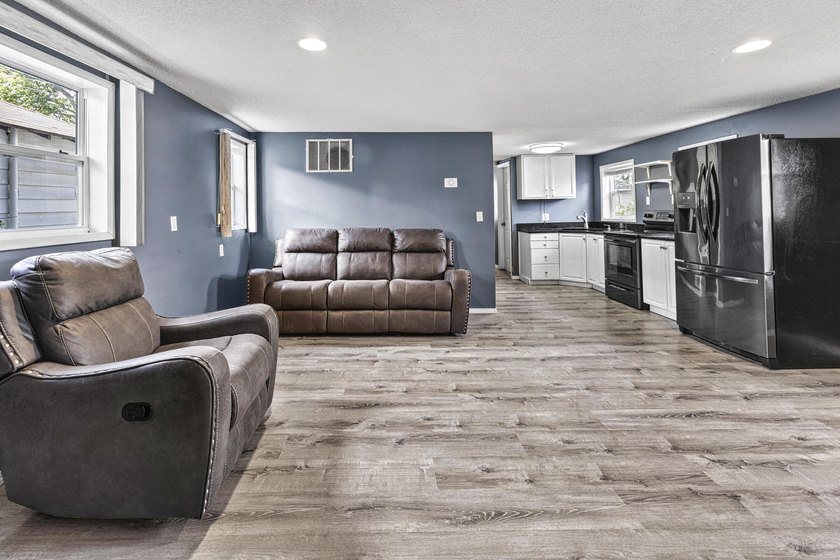 Wake up to beautiful views of Houghton Lake from the spacious - photo 12