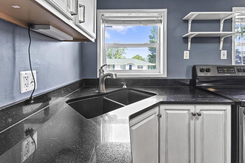 Wake up to beautiful views of Houghton Lake from the spacious - photo 15