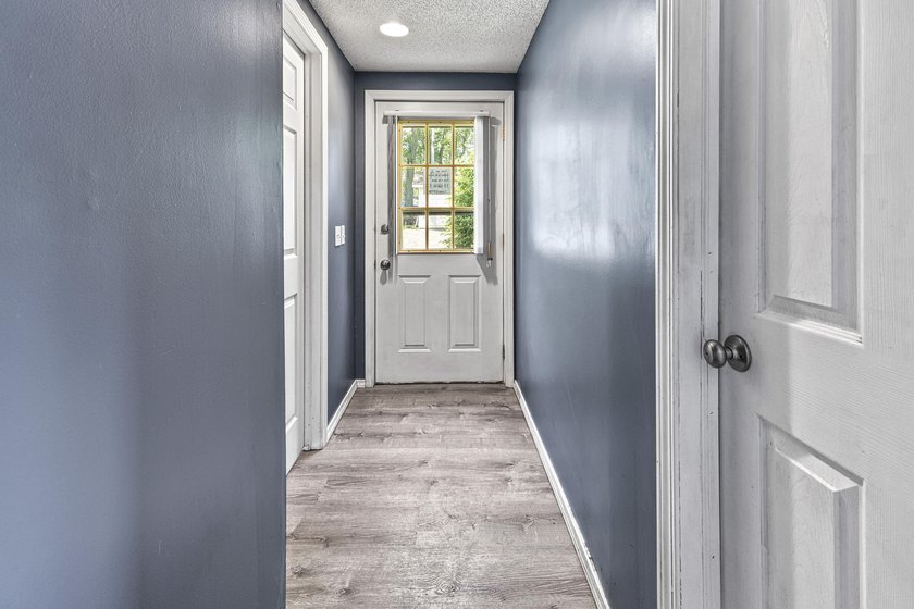 Wake up to beautiful views of Houghton Lake from the spacious - photo 18
