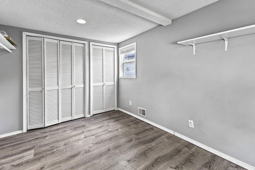 Wake up to beautiful views of Houghton Lake from the spacious - photo 19
