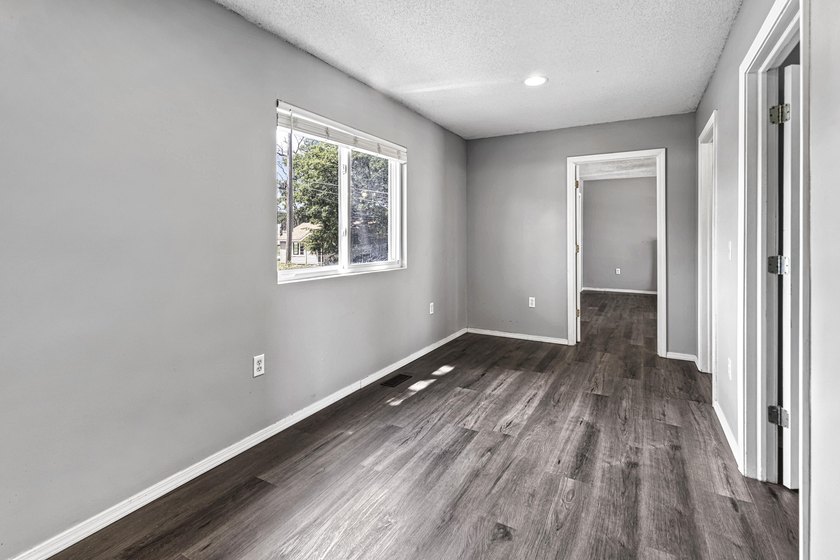 Wake up to beautiful views of Houghton Lake from the spacious - photo 23