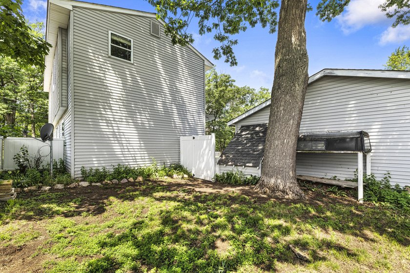 Wake up to beautiful views of Houghton Lake from the spacious - photo 34