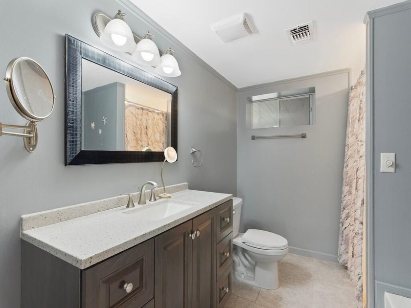 Welcome to this charming 2-bedroom, 1.5-bathroom manufactured - photo 12