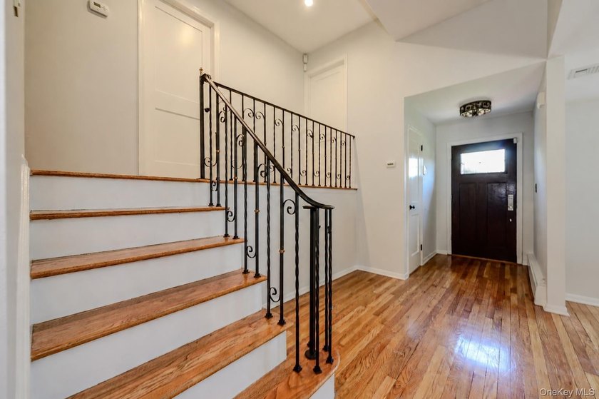Welcome to this completely updated, modern split-level home in - photo 2