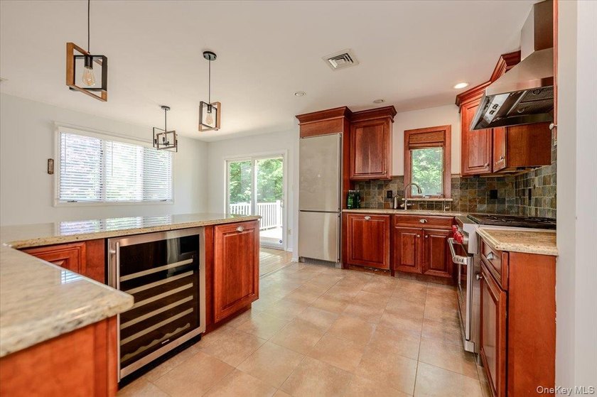 Welcome to this completely updated, modern split-level home in - photo 7