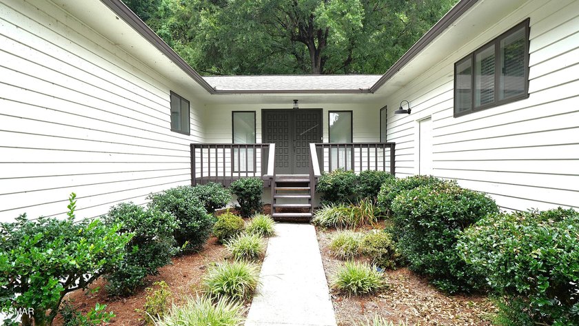 Located within the picturesque lakefront community that offers a - photo 2