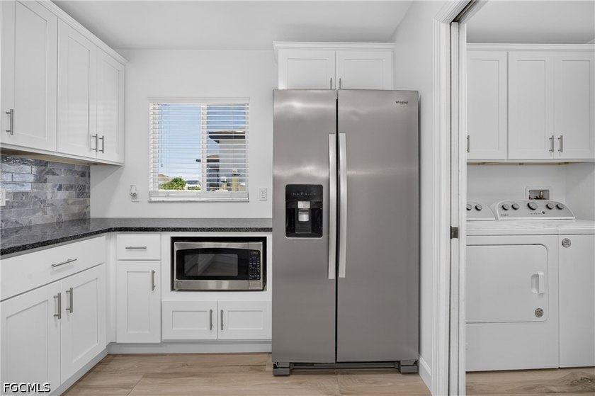 Welcome to this beautifully updated pool home in the rapidly - photo 14